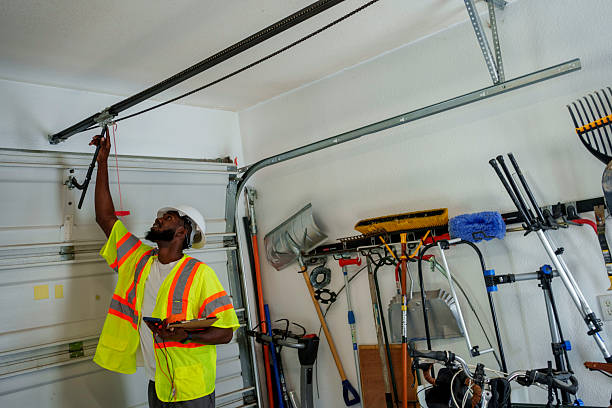 Professional Garage Door Panel Replacement technician working in Aurora, IN